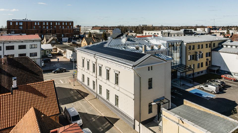 Civic cultural building with an integrated solar metal roof