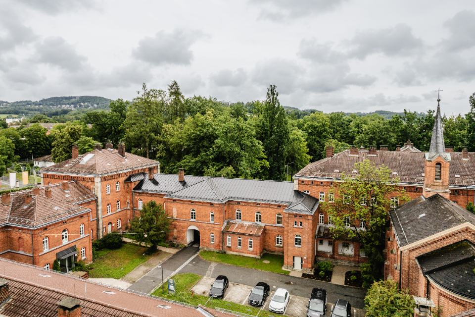 Heritage-designated institutional building with an integrated solar roof